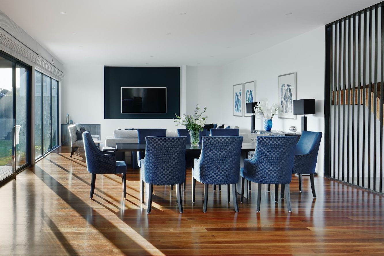 white and blue chairs beside white table